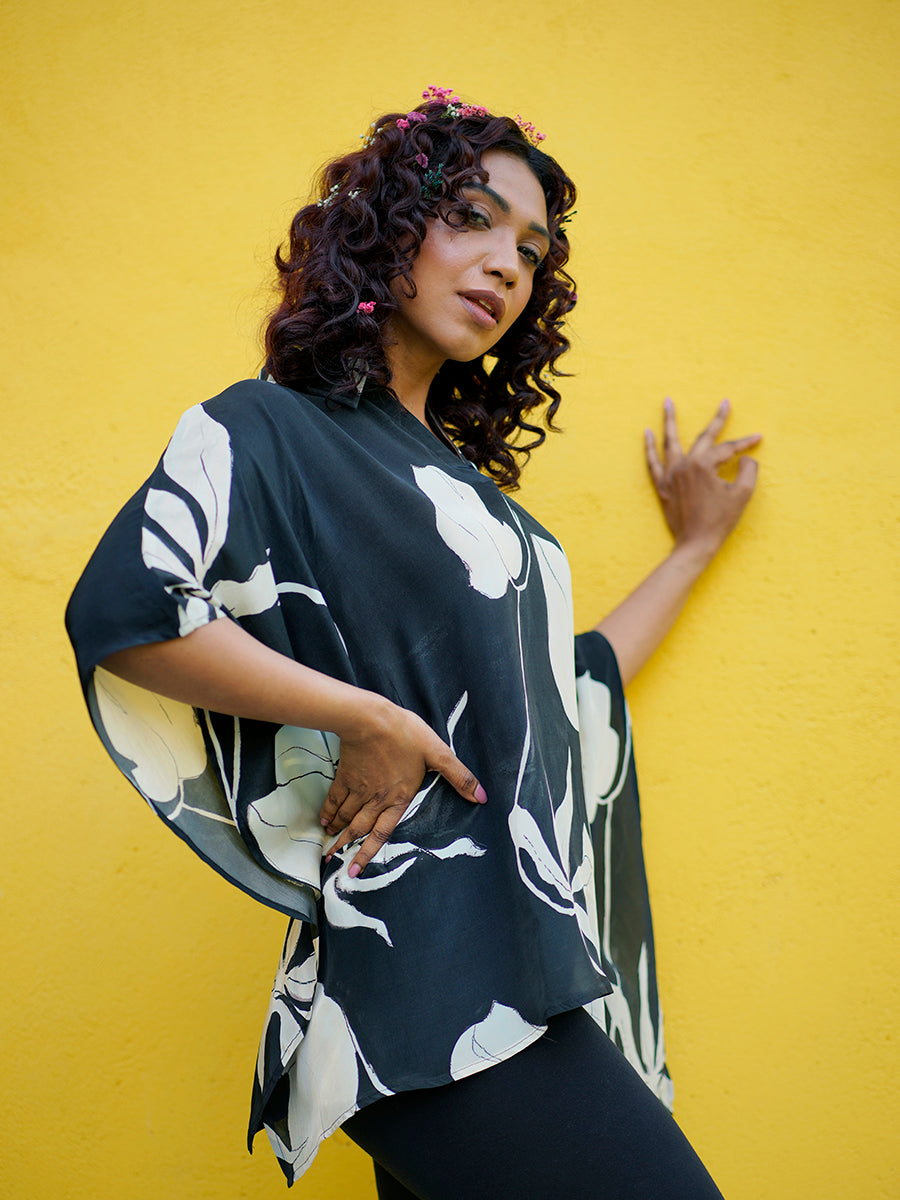 "Elegant front view of the Black Ivy Crepe Kaftan Top, showcasing its floral print and comfortable relaxed fit."