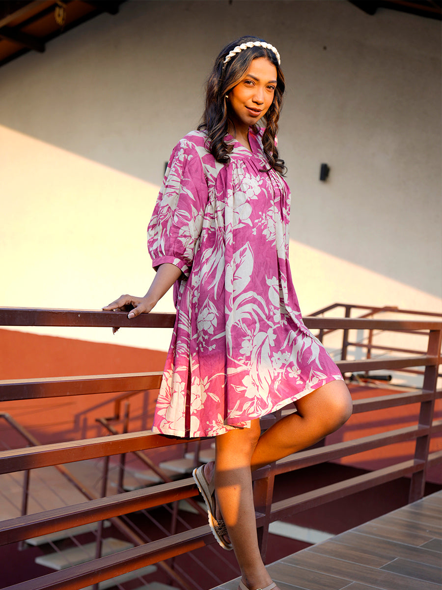 "Side view of the Cherry Blush Breezy Flow Dress, highlighting the flattering knee-length and comfortable fit."