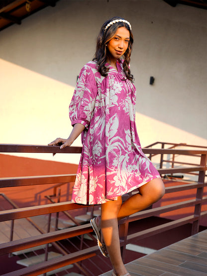 "Side view of the Cherry Blush Breezy Flow Dress, highlighting the flattering knee-length and comfortable fit."