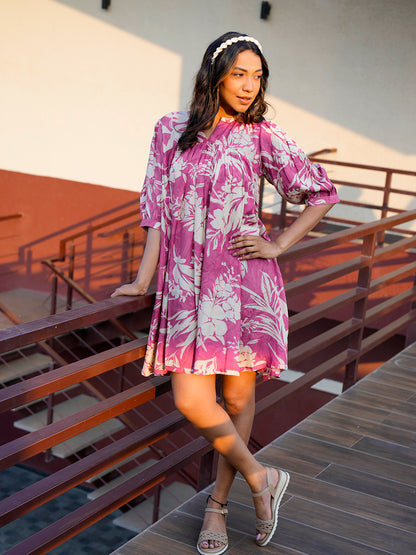 Front view of Cherry Blush Breezy Flow Dress in muslin fabric, showcasing knee-length design and flowy silhouette."