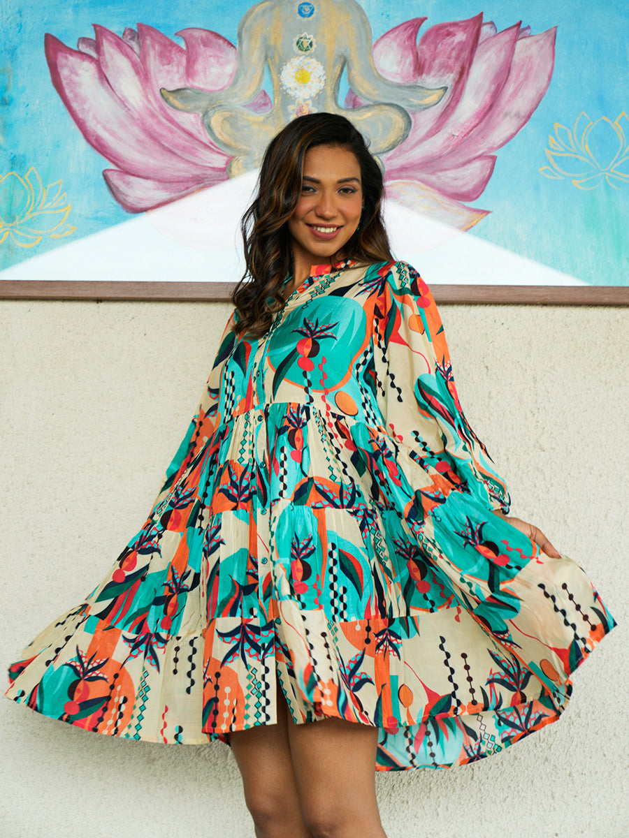"Close-up view of the Abstract Printed Short Dress showing vibrant geometric prints and soft fabric texture."

