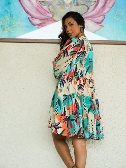 "Back view of the Abstract Printed Short Dress, highlighting the flowing silhouette and unique geometric design."

