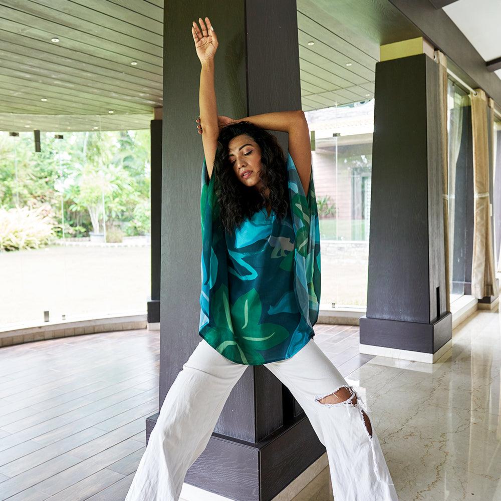 "Model posing in Beat the Blues Kaftan Top, perfect for casual and festive wear."