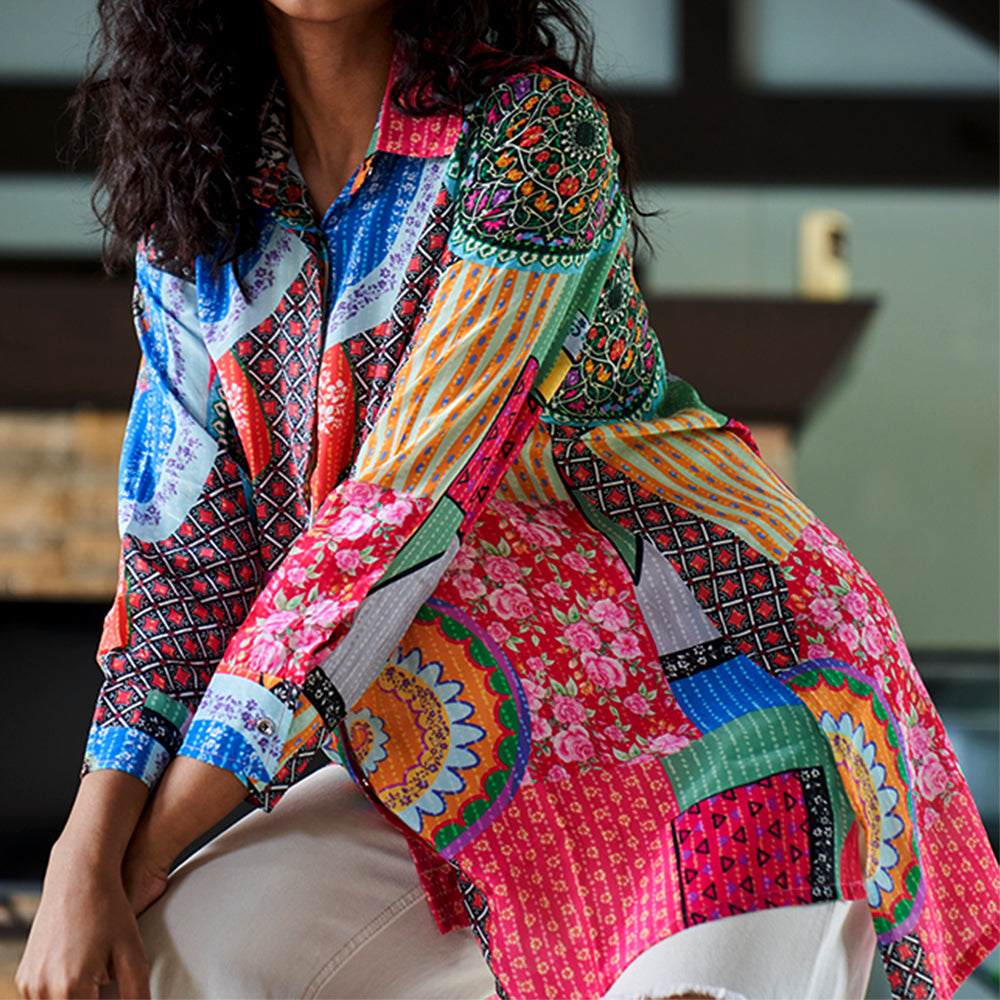 Flat lay of multicolor abstract shirt top in breathable crepe material
