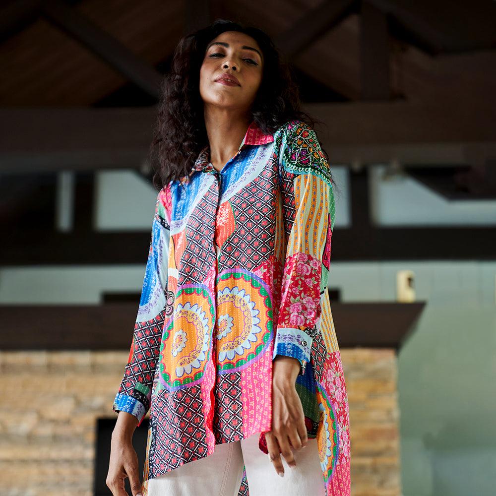 Close-up of crepe fabric showcasing bold abstract pattern and smooth texture