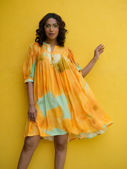 Side profile of muslin Yellow Sunshine Flow Dress showcasing V-cut neckline

