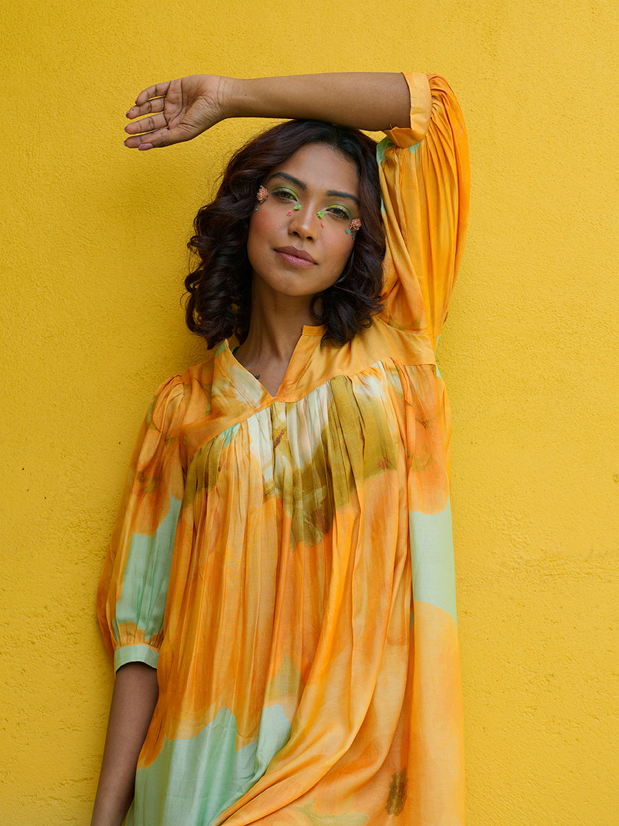 Front view of Yellow Sunshine Flow Dress with floral print and pintuck detailing

