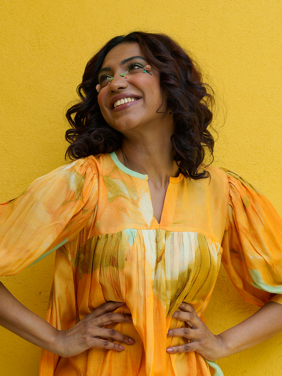 Close-up of hand-drawn floral prints on Yellow Sunshine Flow Dress

