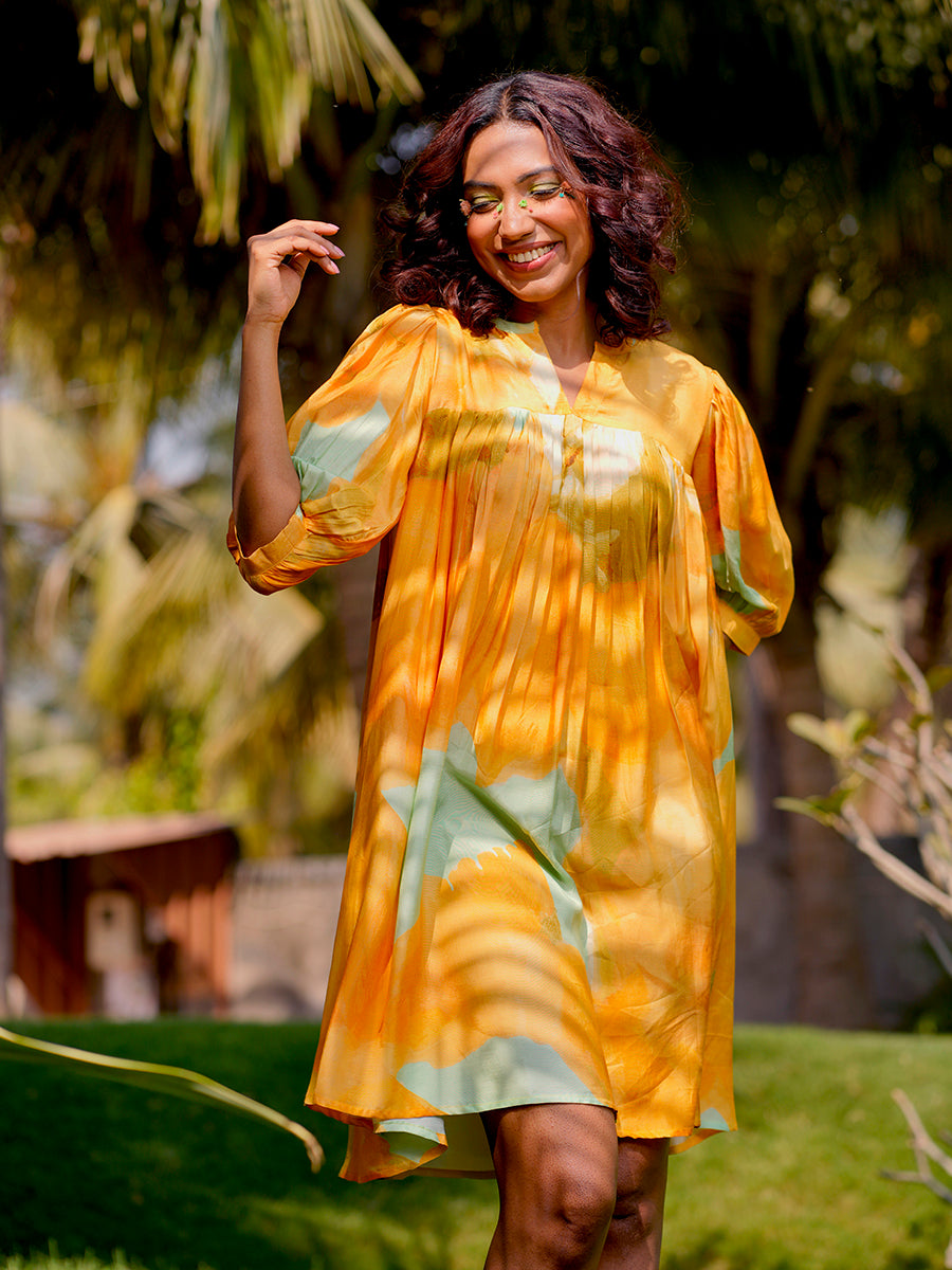 Model wearing Yellow Sunshine Flow Dress, displaying full length and sleeve design

