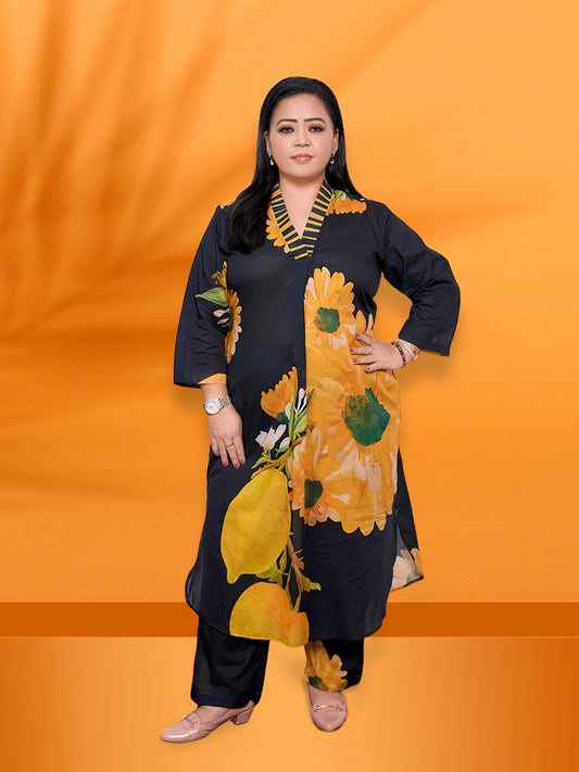 Front view of model wearing sunflower cotton kurta co-ord set with yellow floral print and relaxed fit
