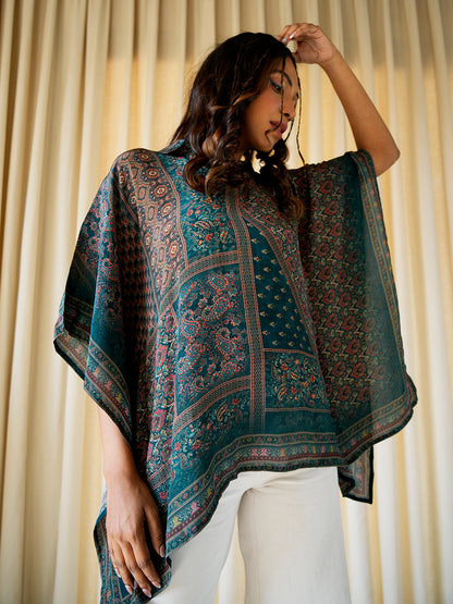  Abstract printed crepe silk kaftan top displayed on a model, showcasing its flowy silhouette.